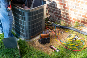 Air conditioner repair being performed